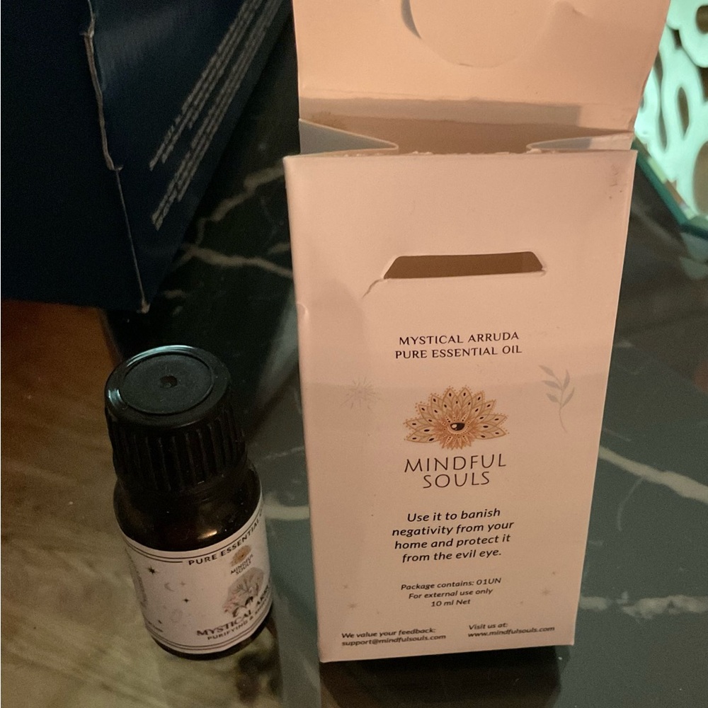 Mystical Arruda Pure Essential Oil - Black and White